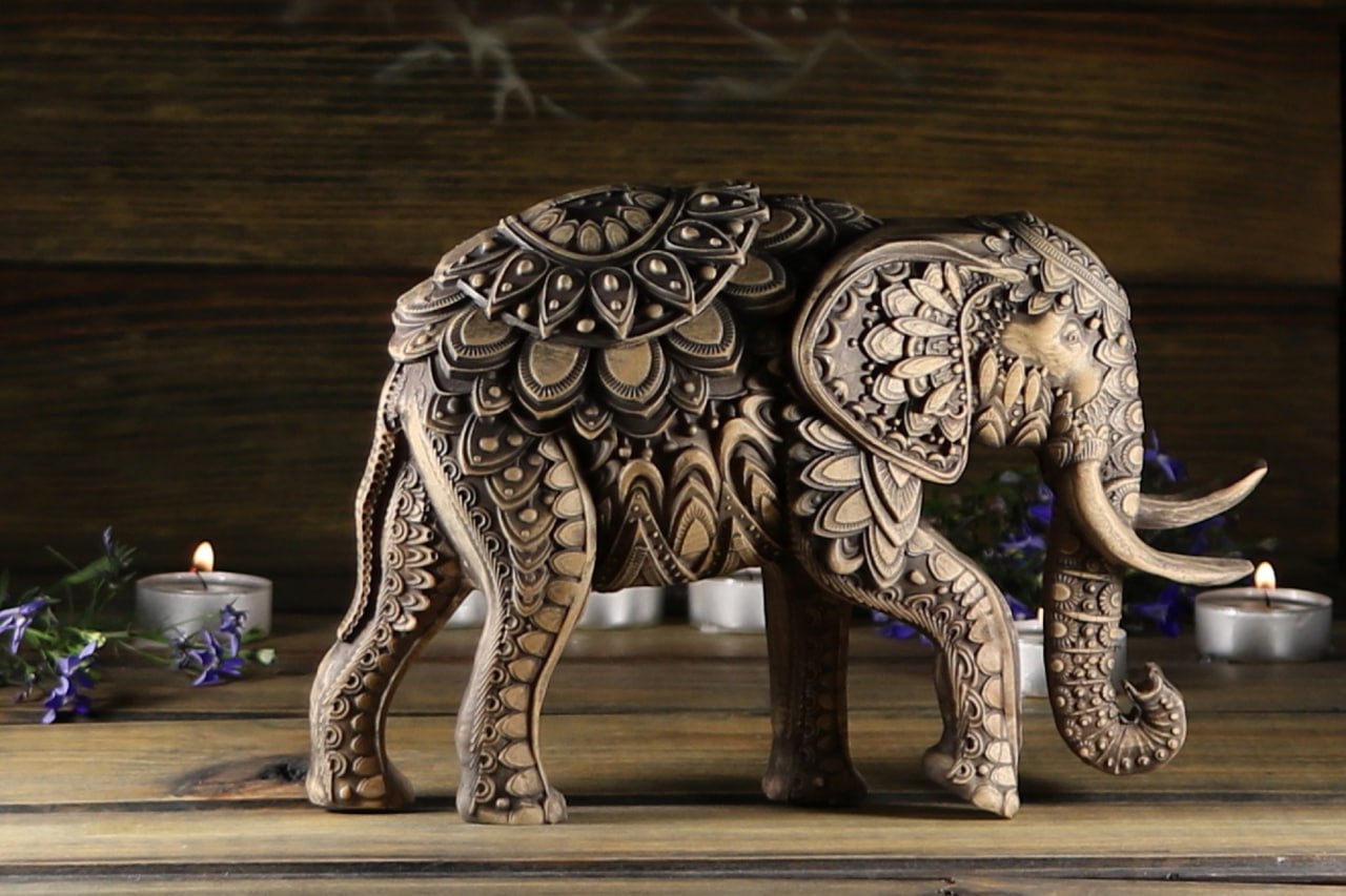 Handcrafted Wooden Elephant Statue: Symbol of Strength & Exotic Elephant Decor