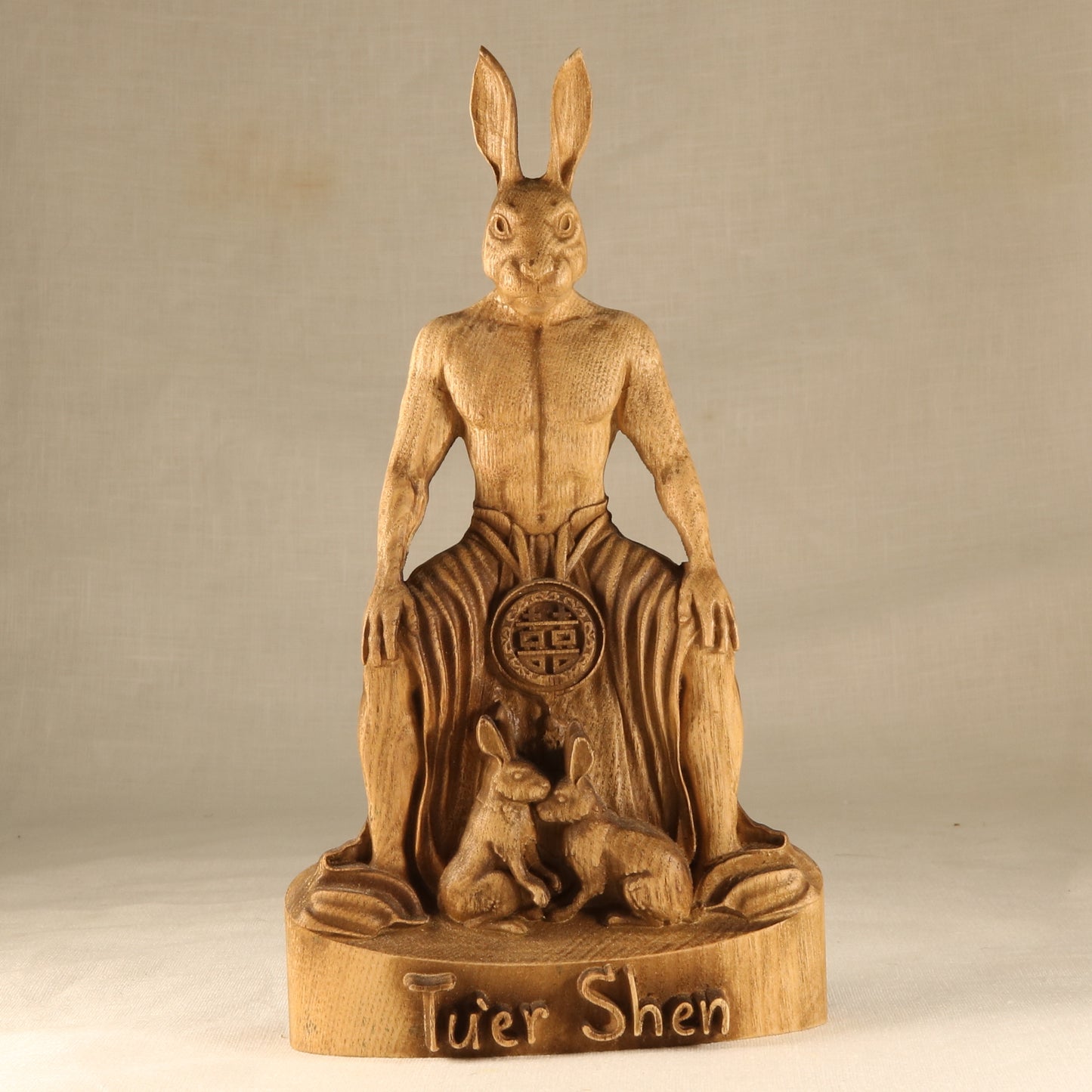 Tu'er Shen statue, Rabbit God, Chinese mythology, queer art, LGBT+ protector, carved wooden statue