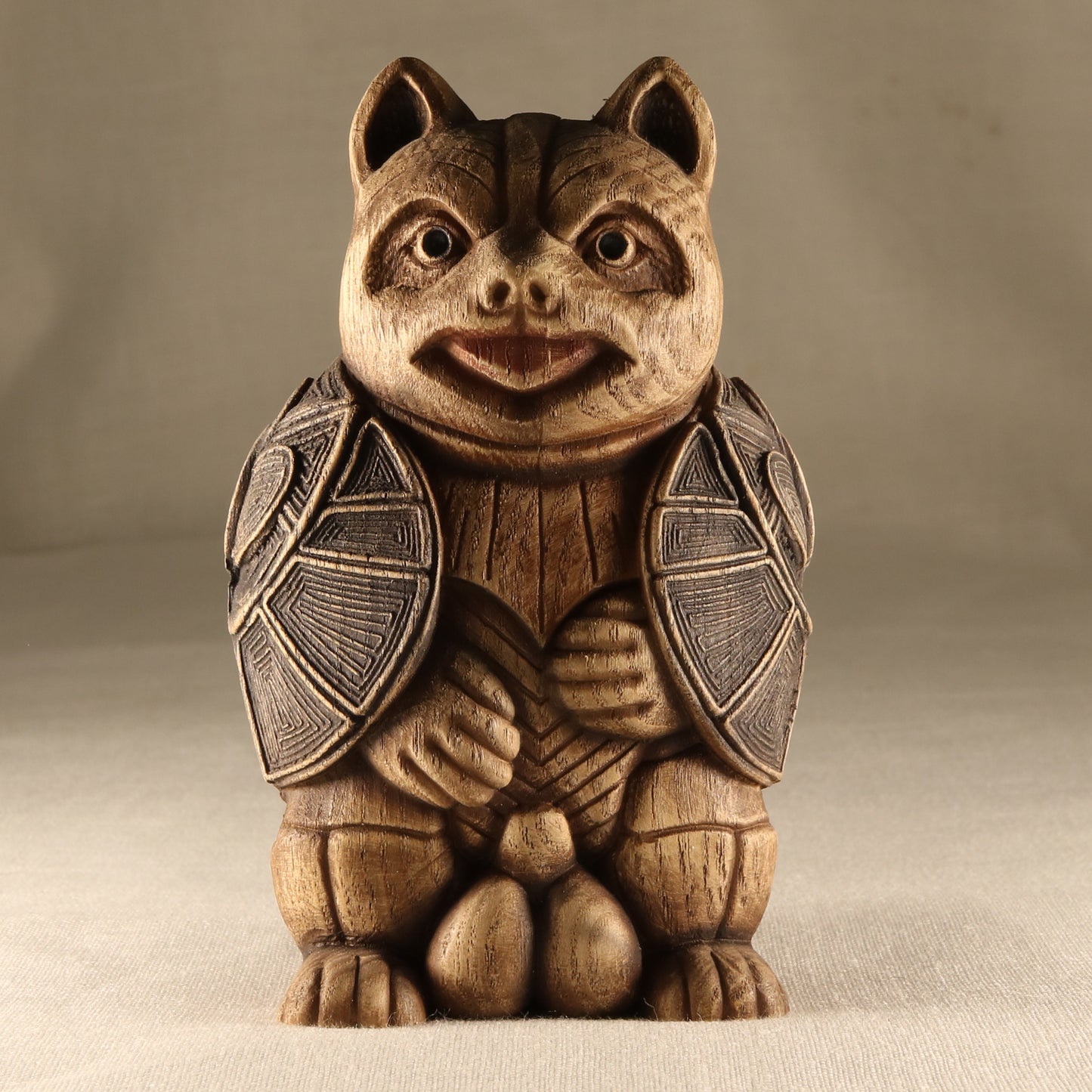 Tanuki Statue - A Charming Wooden Carved Symbol of Luck and Happiness