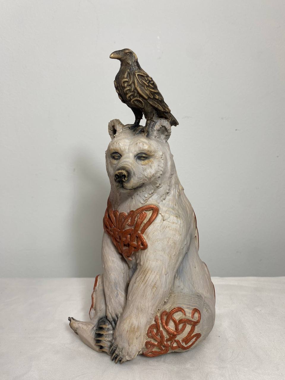 White Bear & Raven Statue: A Symbolic Carved Wooden Artwork