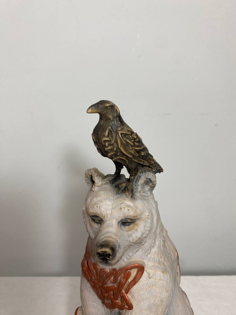 White Bear & Raven Statue: A Symbolic Carved Wooden Artwork