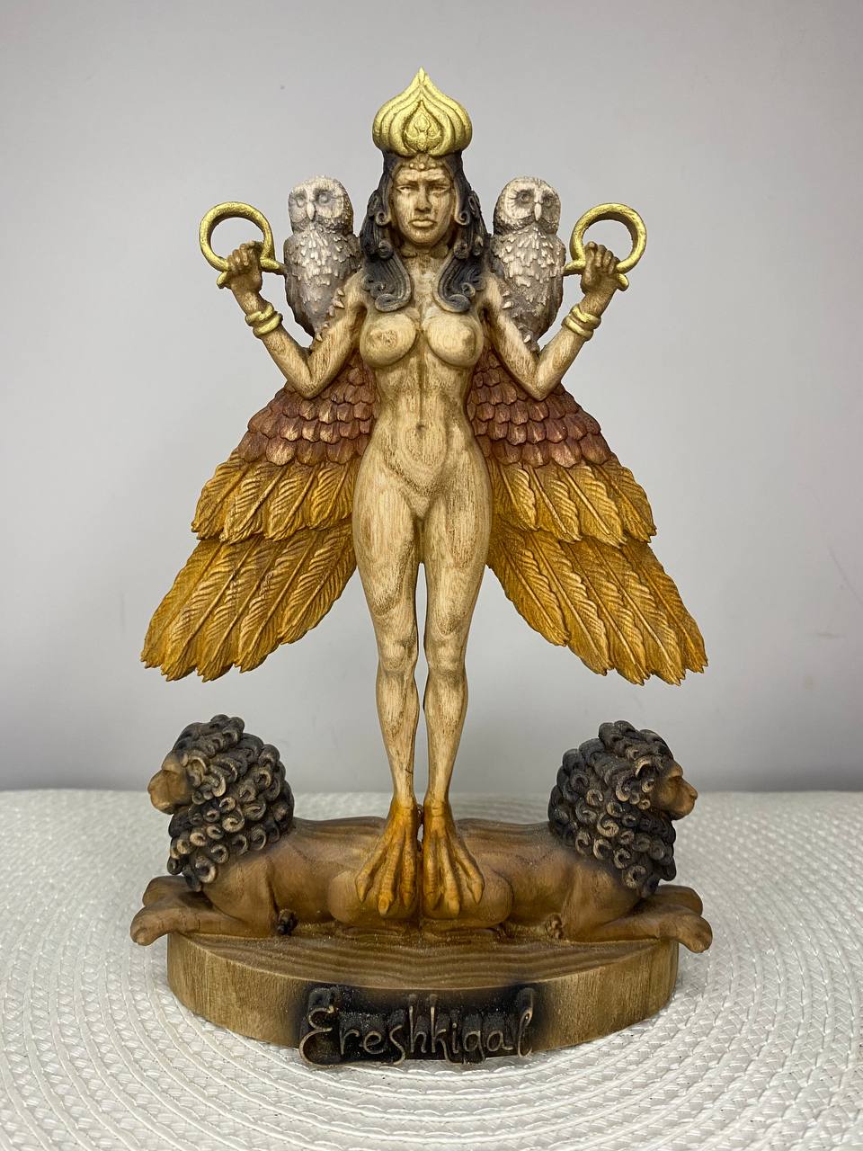 hand-carved wooden statue of Ereshkigal, Mesopotamian Goddess of the Underworld, crafted from ecological ash wood