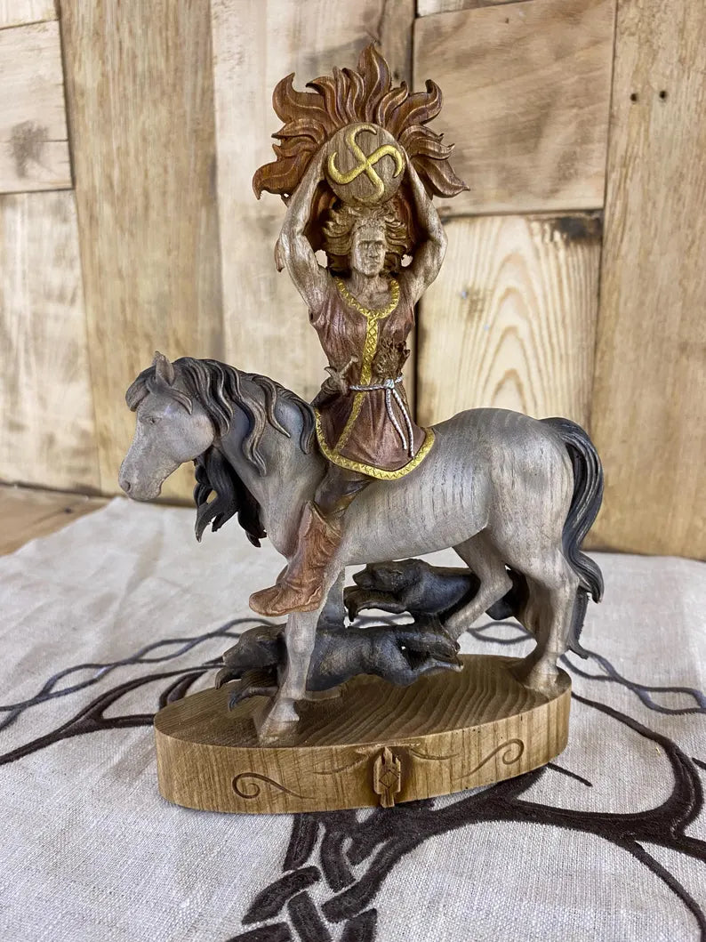 Hand carved wooden statue of Yarilo, Slavic sun god riding a horse and holding a solar symbol above his head, inspired by pagan mythology, spring, fertility, and harvest traditions.
