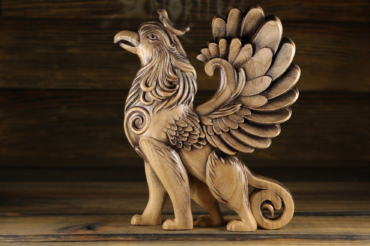 Embrace the Mystique of the Wooden Griffin Statue