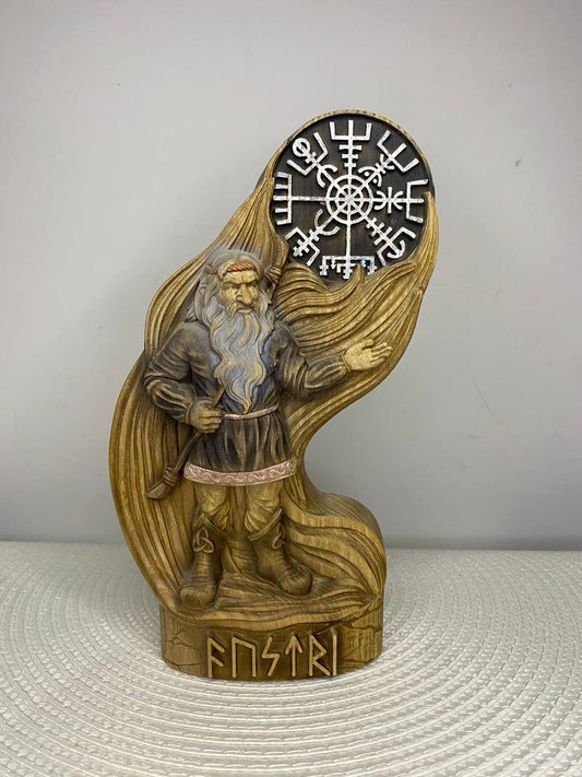 Austri Norse dwarf figurine, a hand-carved wooden Nordic gnome with a long braided beard, dark tunic, belt, and boots, standing beneath a large Norse symbol with runic carvings on the wooden base.