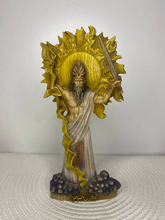 Hand-painted wooden statue labeled YHWH, depicting a divine robed figure with radiant halo, flames, and raised sword, inspired by sacred spiritual symbolism and religious decorative art.

